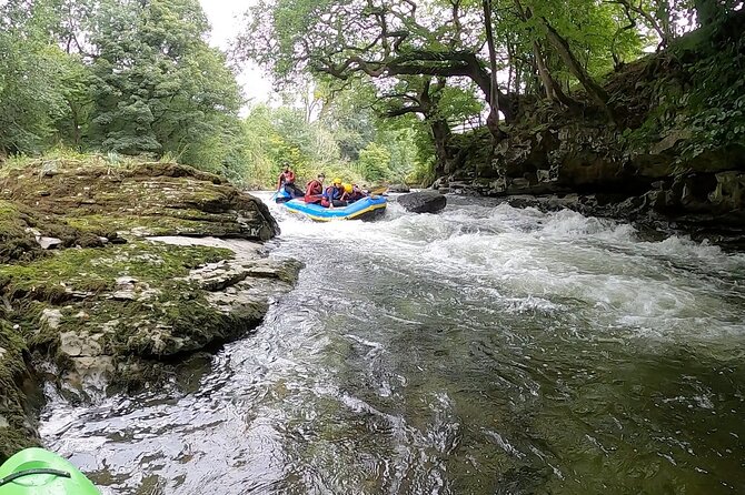Brilliant White Water Rafting in the Lake District UK - Learning to paddle with a guide
