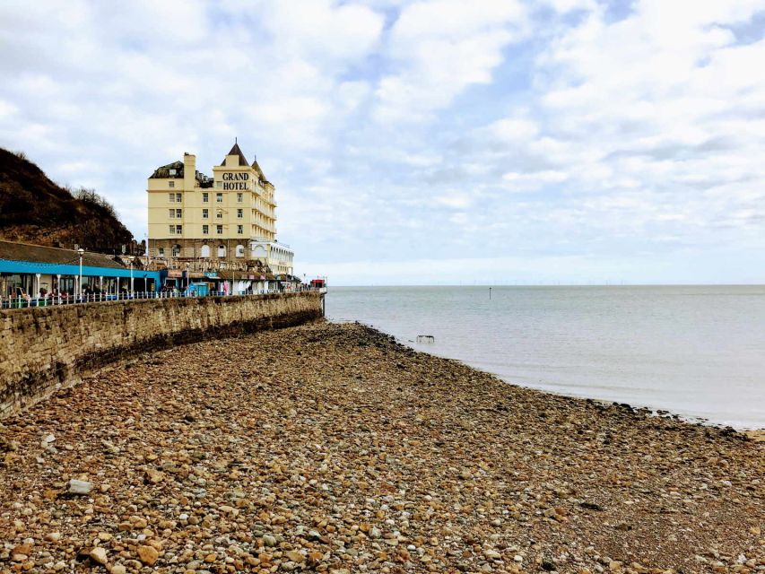 From Chester: Full-Day Guided North Wales Sightseeing Tour - Snowdonia, or Eryri, changes the scale