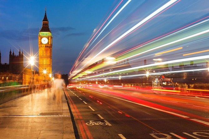 London by Night Sightseeing Open Top Bus Tour with Live Guide - Buckingham Palace beneath evening lights