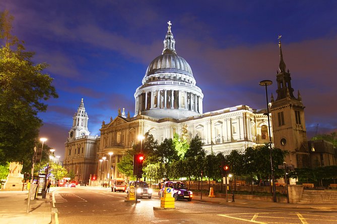 London by Night Sightseeing Open Top Bus Tour with Live Guide - Trafalgar Square and Piccadilly after sunset