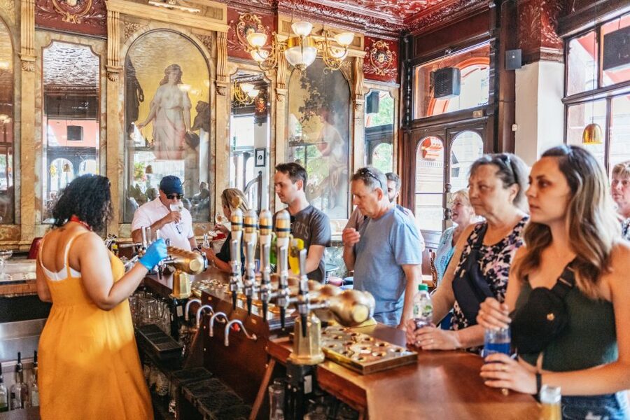 London: Historic Pubs of Central London Walking Tour - The Victorian gin palace and its wall of spirits