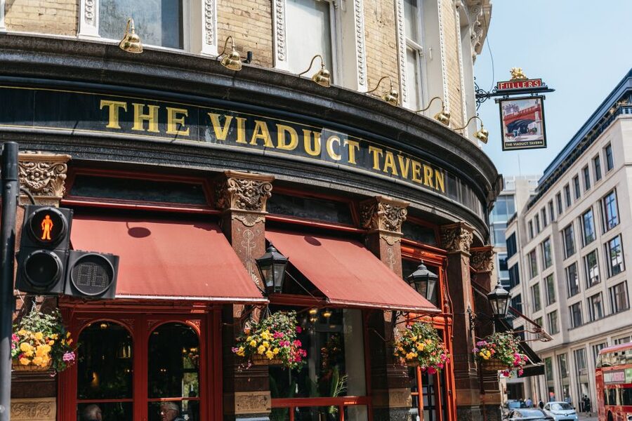 London: Historic Pubs of Central London Walking Tour - Walking toward Strand and Covent Garden