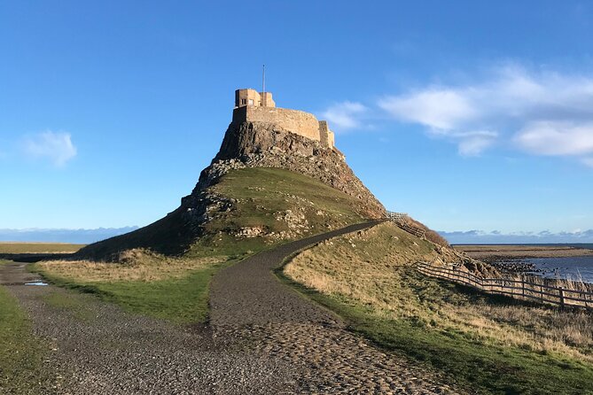 Pilgrims' Path walk across the sands to Holy Island - Lindisfarne Priory from the rocky outcrop