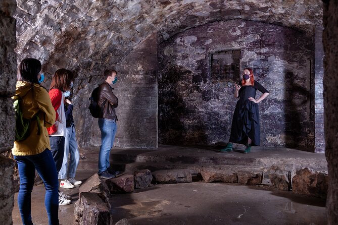 Underground Vaults Walking Tour in Edinburgh Old Town - Down the narrow entrance to South Bridge